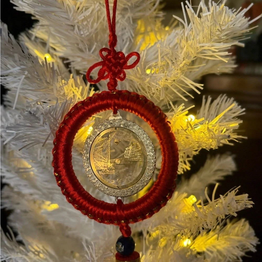 Chinese Feng Shui lucky coin hanging charm with a red knot and tassel Ornament